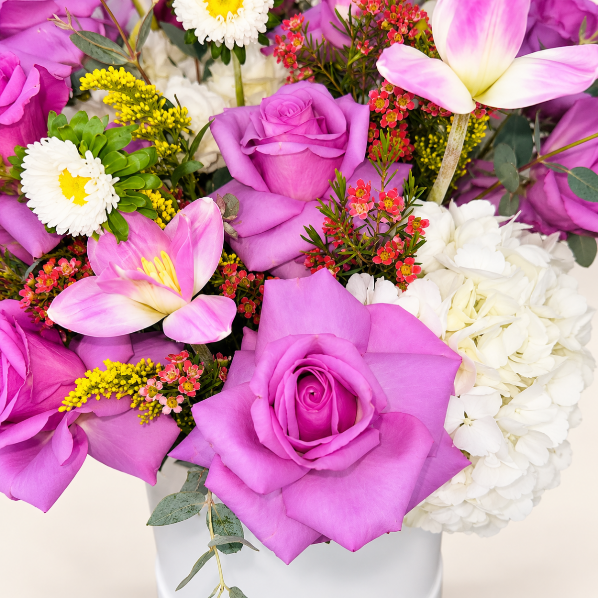 Close-up of lavender roses, white hydrangeas and seasonal blooms arranged by AG Floral Studio in Miami