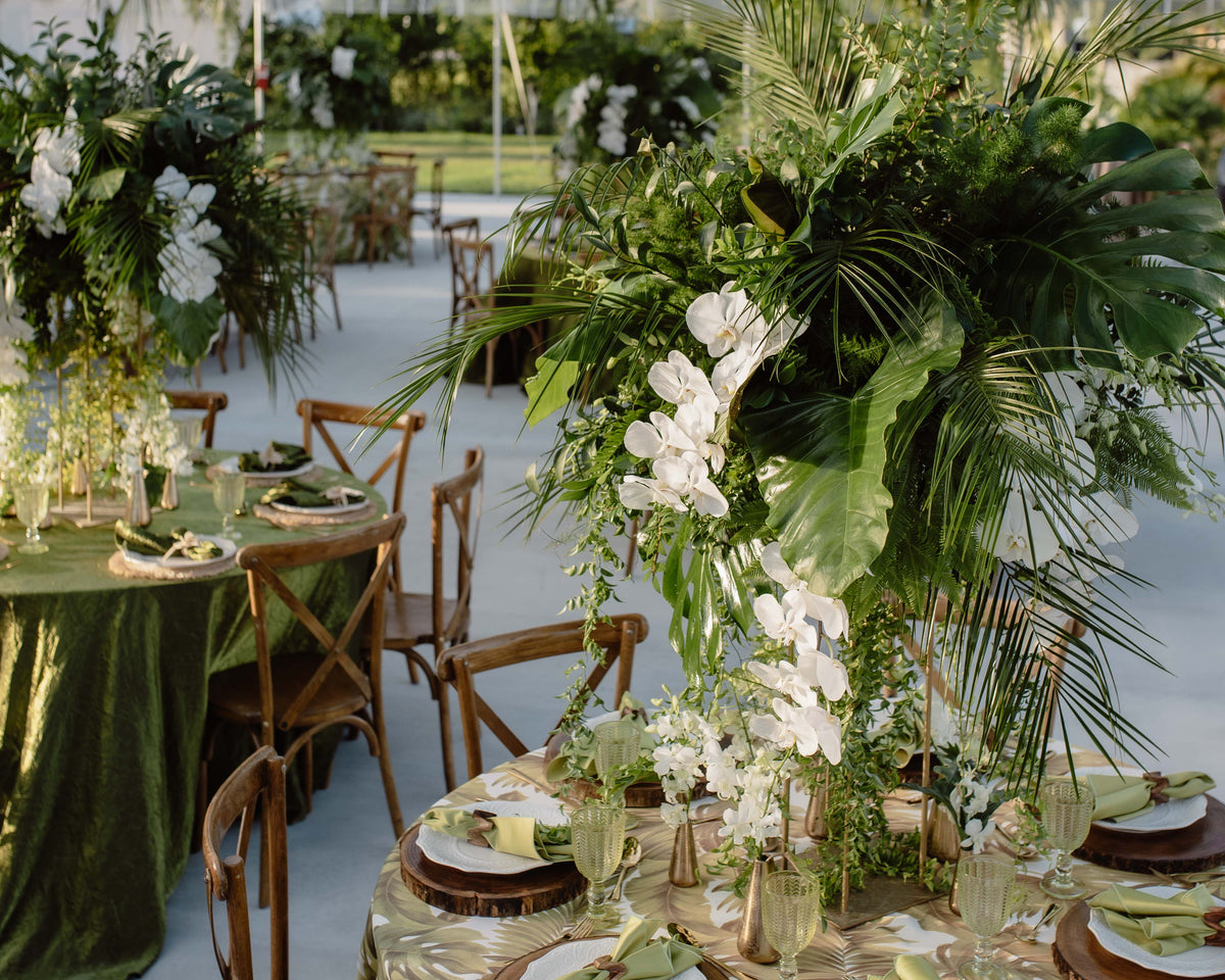 tropical wedding with orchids and greenery