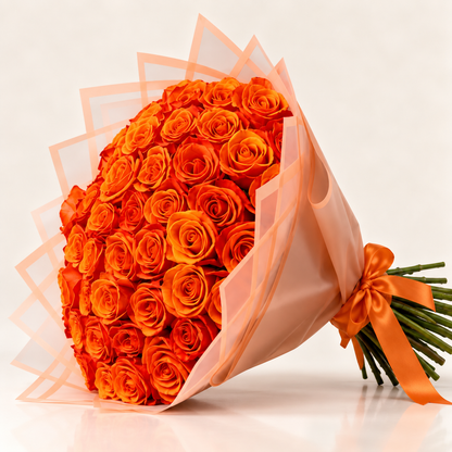 Luxury orange rose bouquet with peach wrapping by AG Floral Studio in Miami